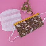 Face mask with feather fabric.