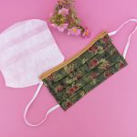 Face mask. Non-medical. Fall fabric, green with pine cones.