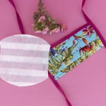 Facemask from tropical floral fabric.