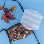 Handmade face mask. Brown feather fabric.