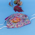 Turquoise floral fox fabric. Face mask with elastics.