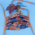 pandemic fall fashion. maple leaves mask.