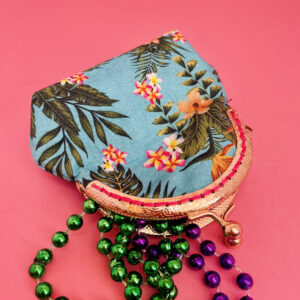 Coin Purse with light blue with tropical leaves and pink frangipani blossoms.