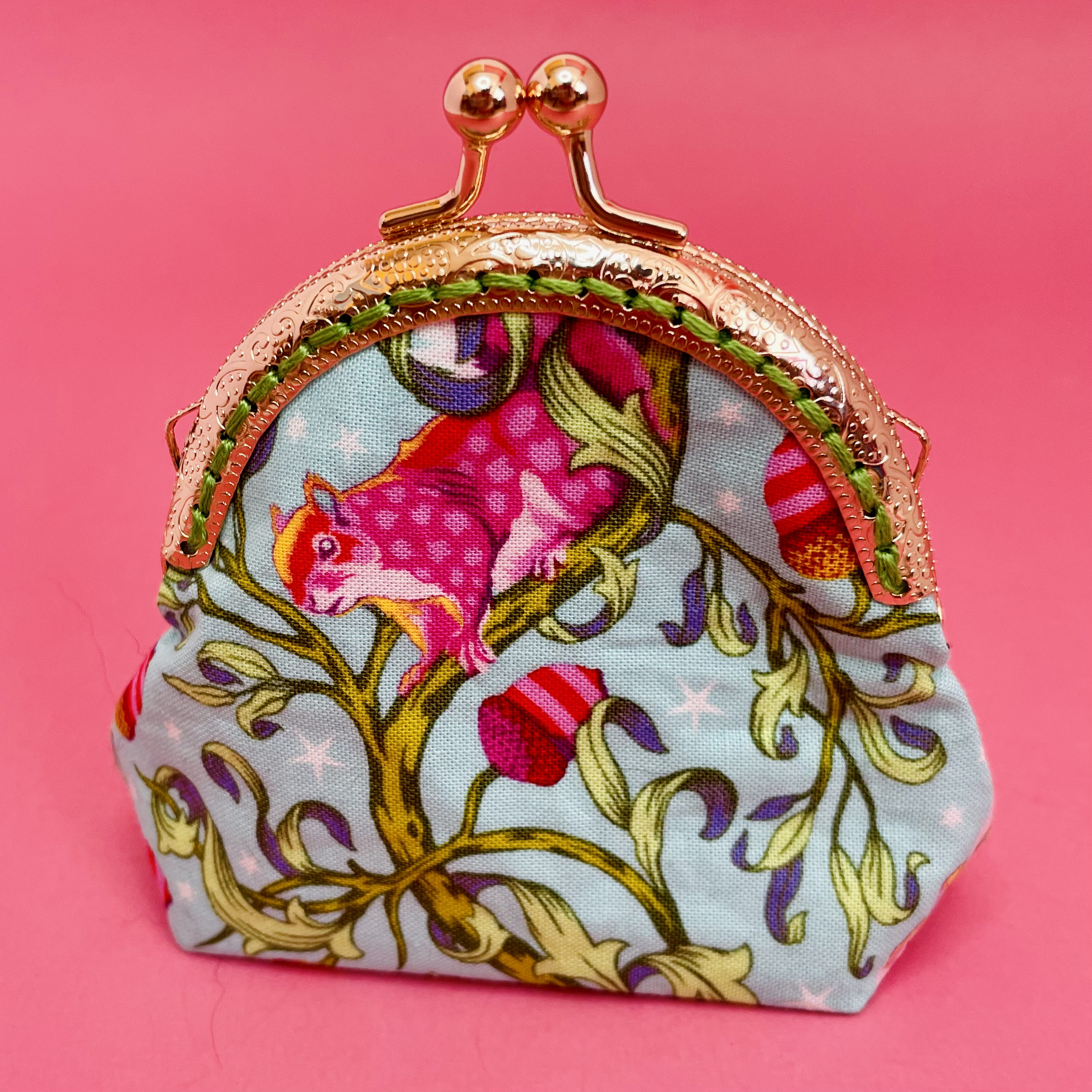 Coin Purse. Mint green with pink squirrels and nuts.