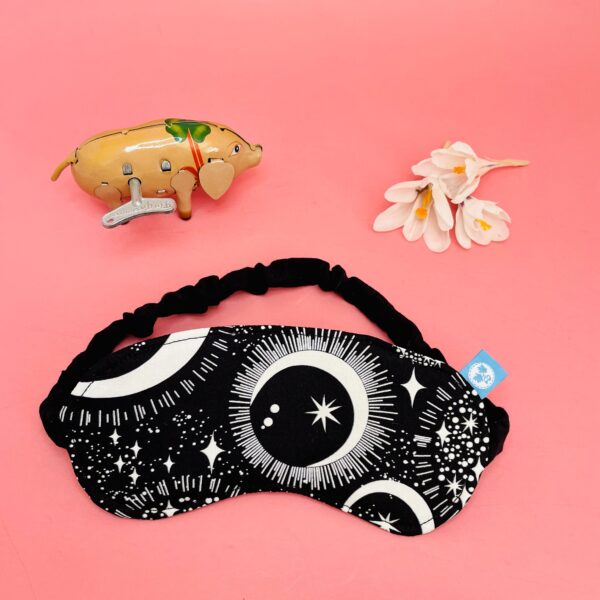 Black with white "glow-in-the-dark" moon and stars. Sleep Mask.
