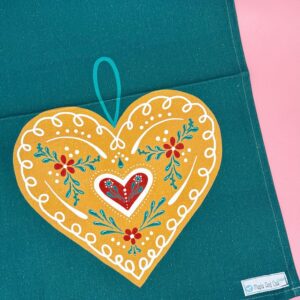Big green German gingerbread heart - tea towel