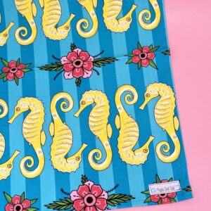 Sea horse and flowers - tea towel