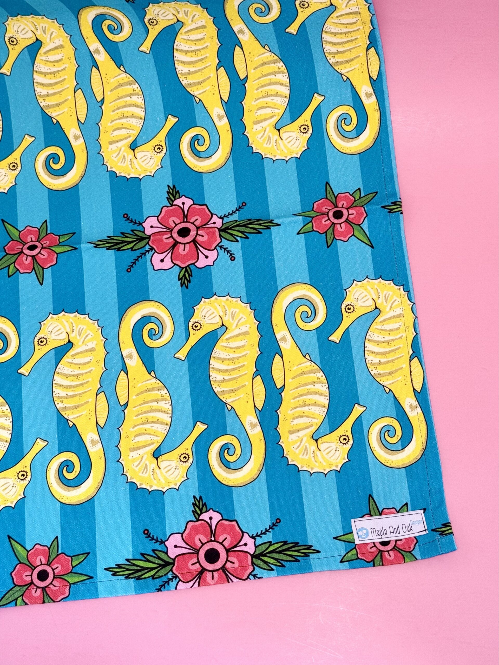 Sea horse and flowers - tea towel