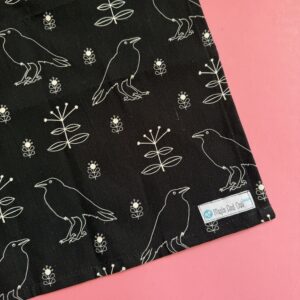Black crows and flowers - tea towel